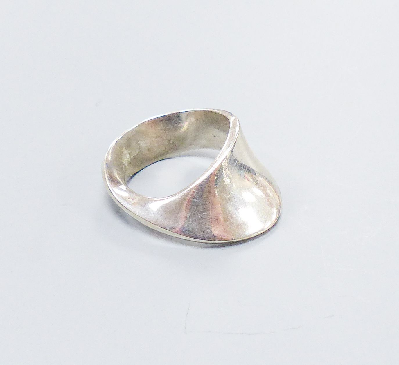 A Georg Jensen sterling ring, no. 148, size O.